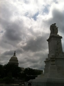 The Peace Monument on the right, the Capitol on the left.  The clouds of war above.